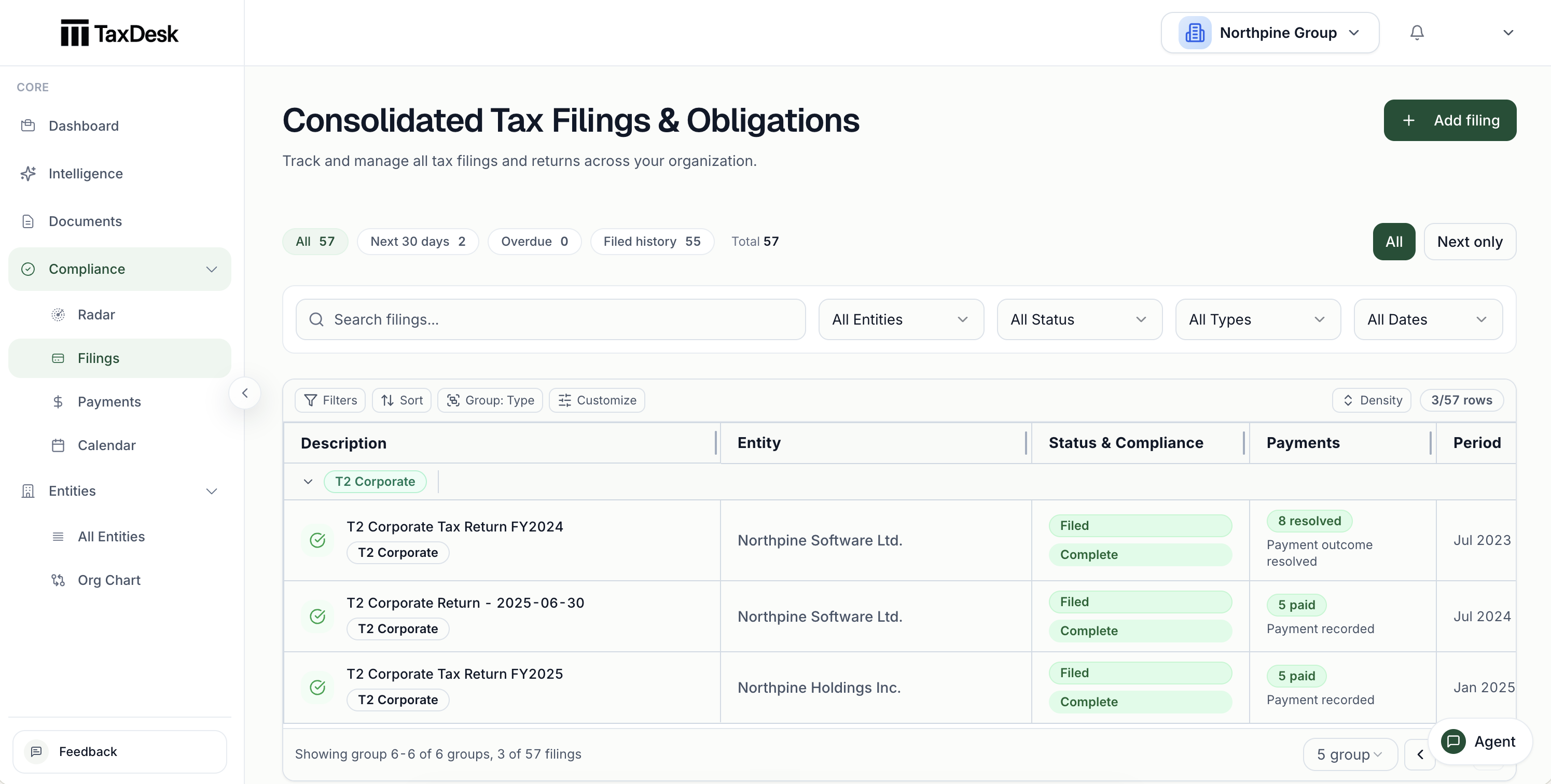 TaxDesk consolidated tax filings and obligations table with status, compliance, and payment details.